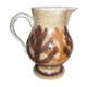 Glazed stoneware jug with hand decoration