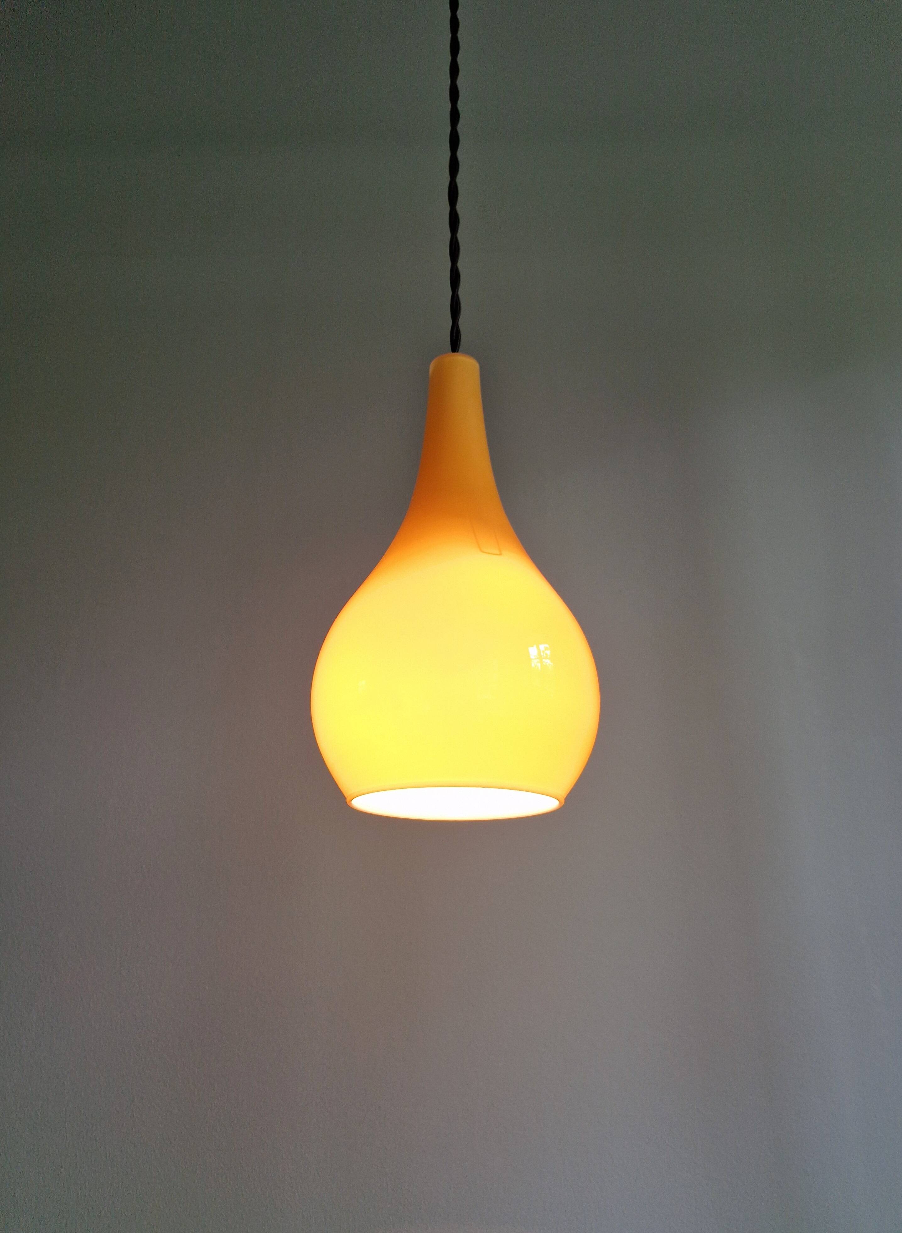Scandinavian pendant light in honey-colored opaline glass, 1960s