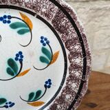 Old plate with brown border and flowers called black bottom