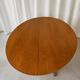 Round table with central base from the 1960s by Baumann.