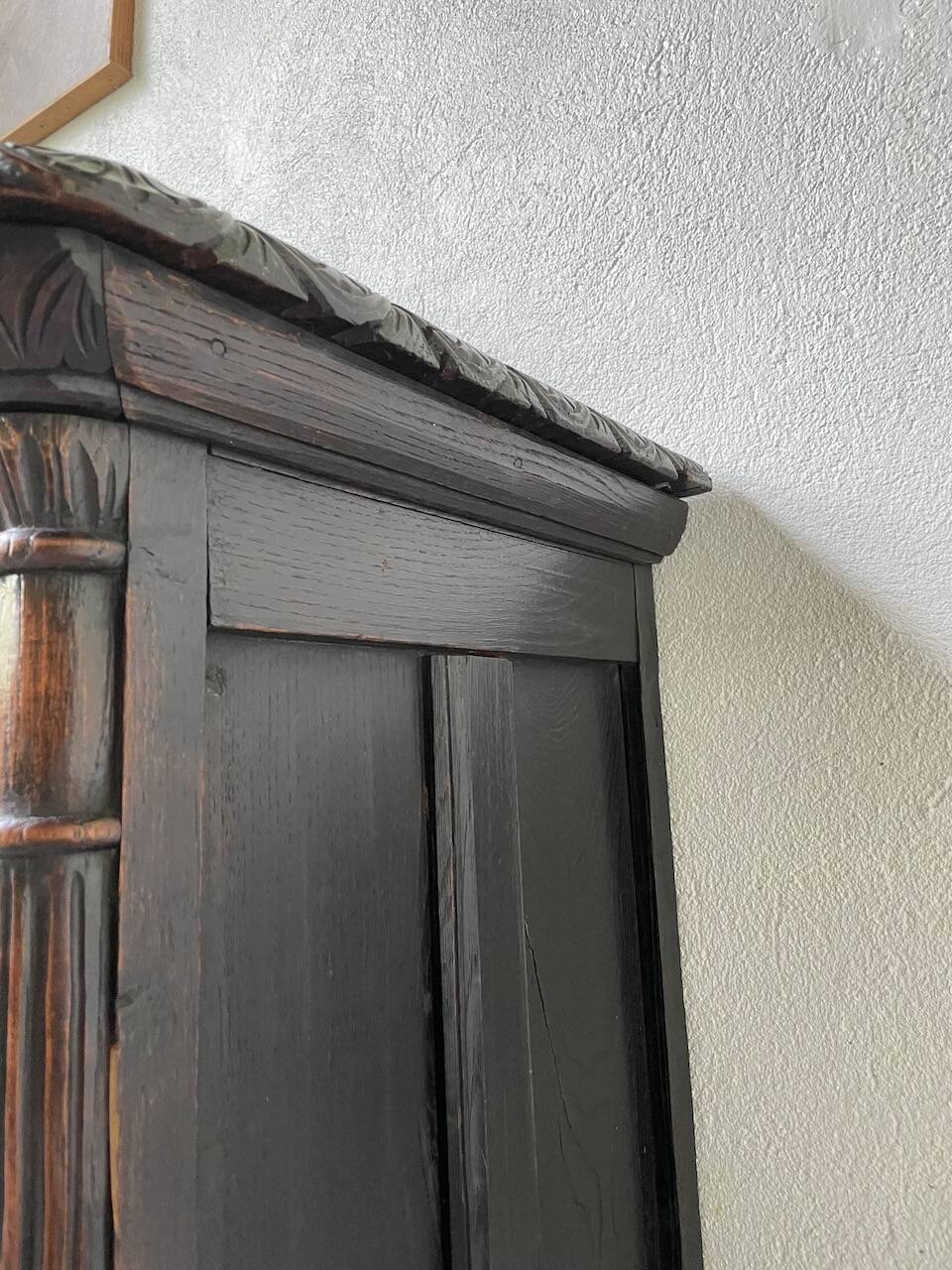 19th century chest of drawers in carved blackened pine
