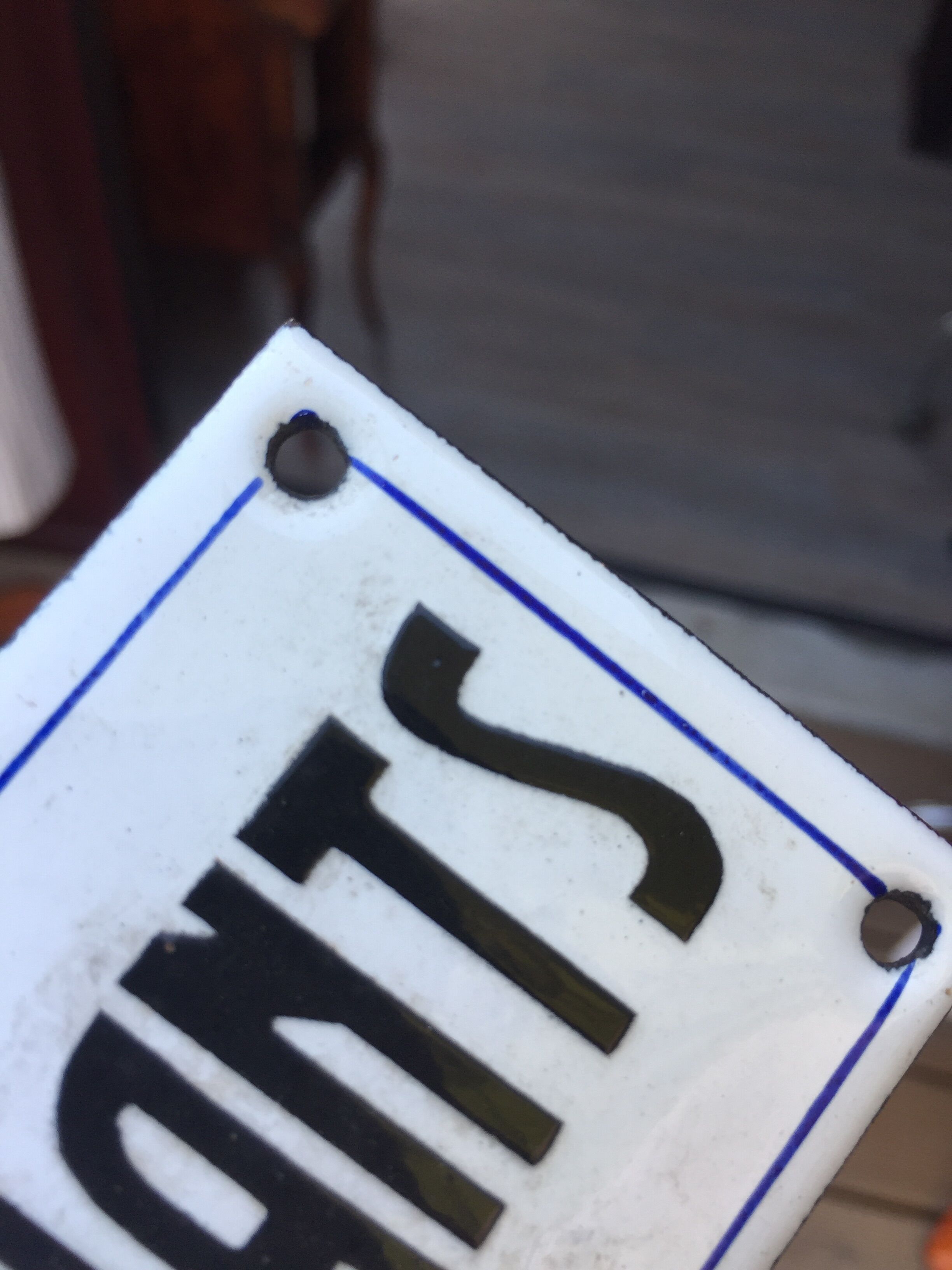 Enamelled sheet metal sign