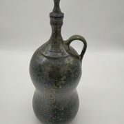 Bottle in iridescent green sandstone from the ceramist jean aimé Poirier