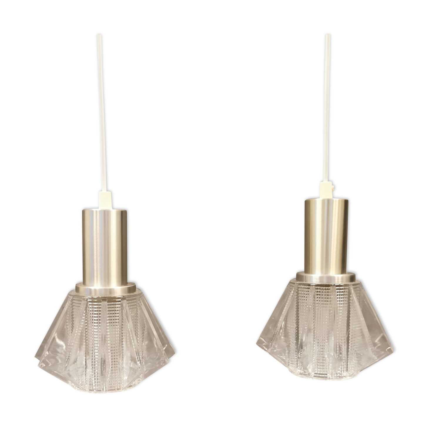 A set of smaller hanging lamps, in hard pressed glass, with metal top
