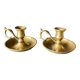 Two brass hand candle holders