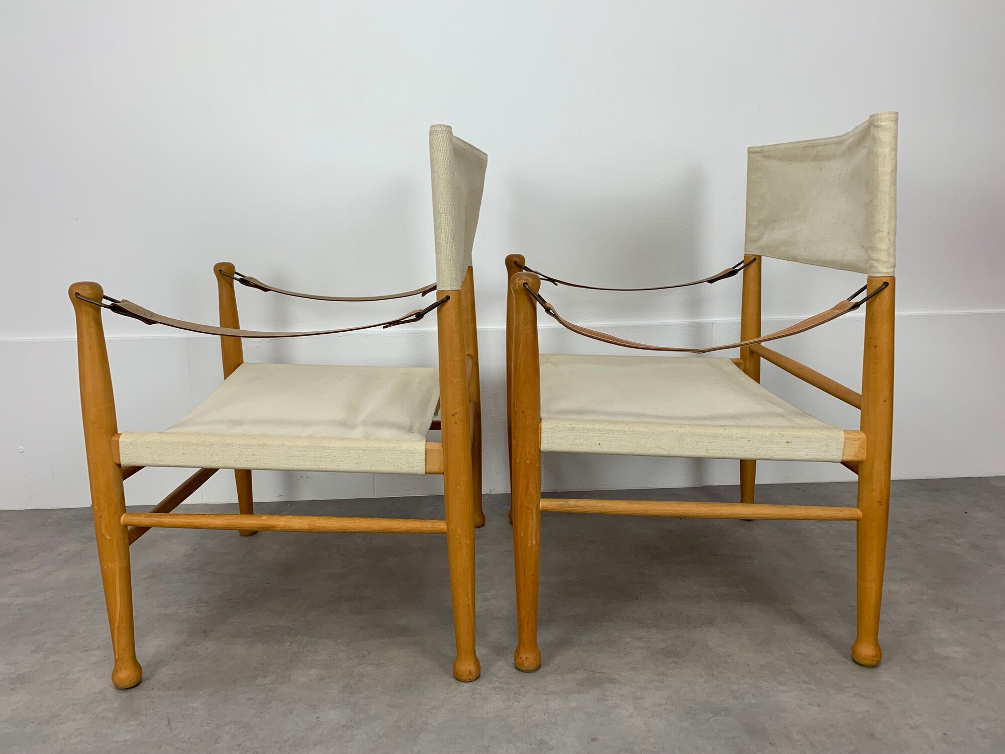 Pair of safari armchairs canvas and leather stretched