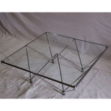 Minimalist coffee table in chrome metal and glass