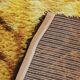 Rya Scandinavian carpet in virgin wool with orange and maroon motifs