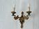 Applique bronze dore de style empire Lucien Gau