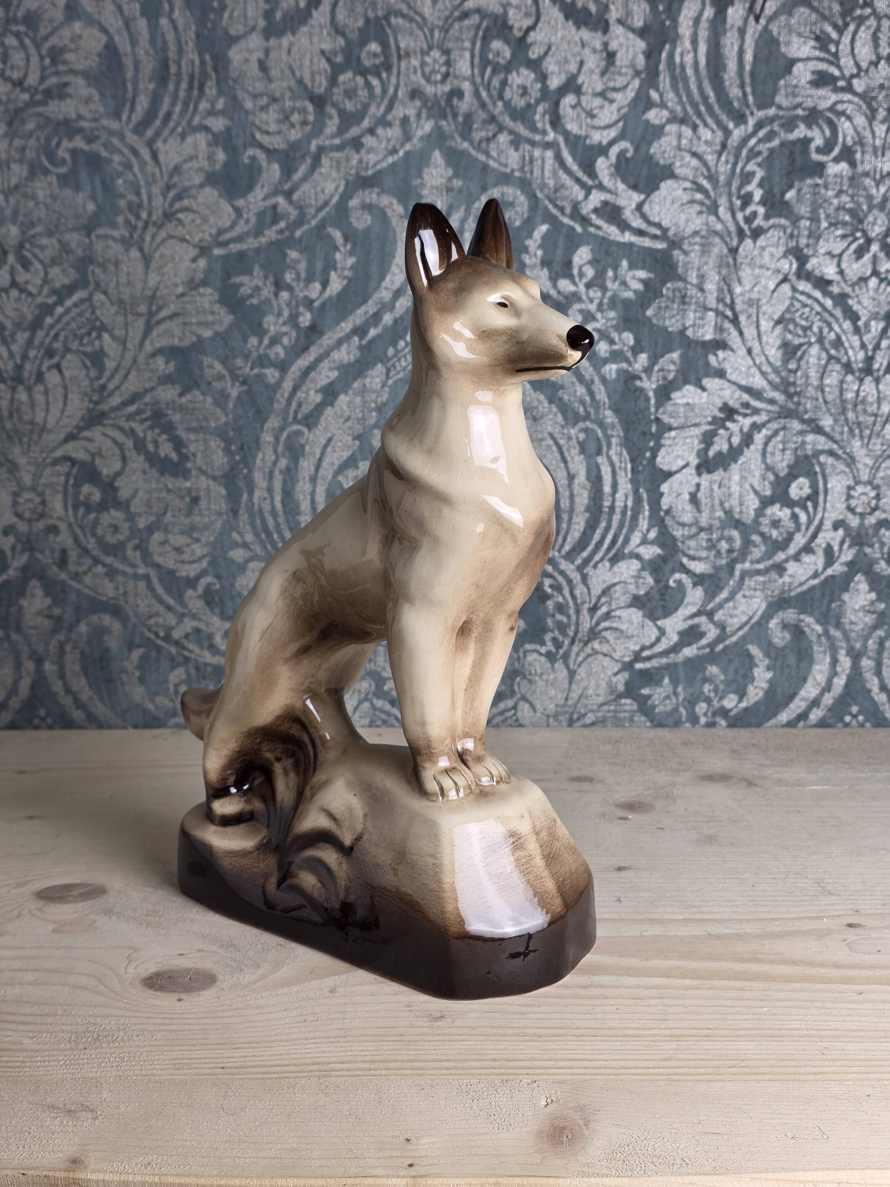 Porcelain shepherd dog, large decorative sculpture.
