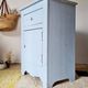 Handcrafted blue chest of drawers.