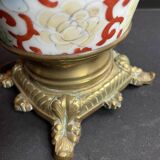 Old Asian vase mounted as a lamp with pagoda lampshade