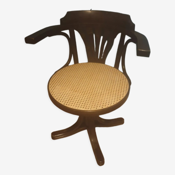 Cane swivel armchair, new cane