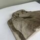 Stone sculpture, two feet on a block, signed D. Paillot.