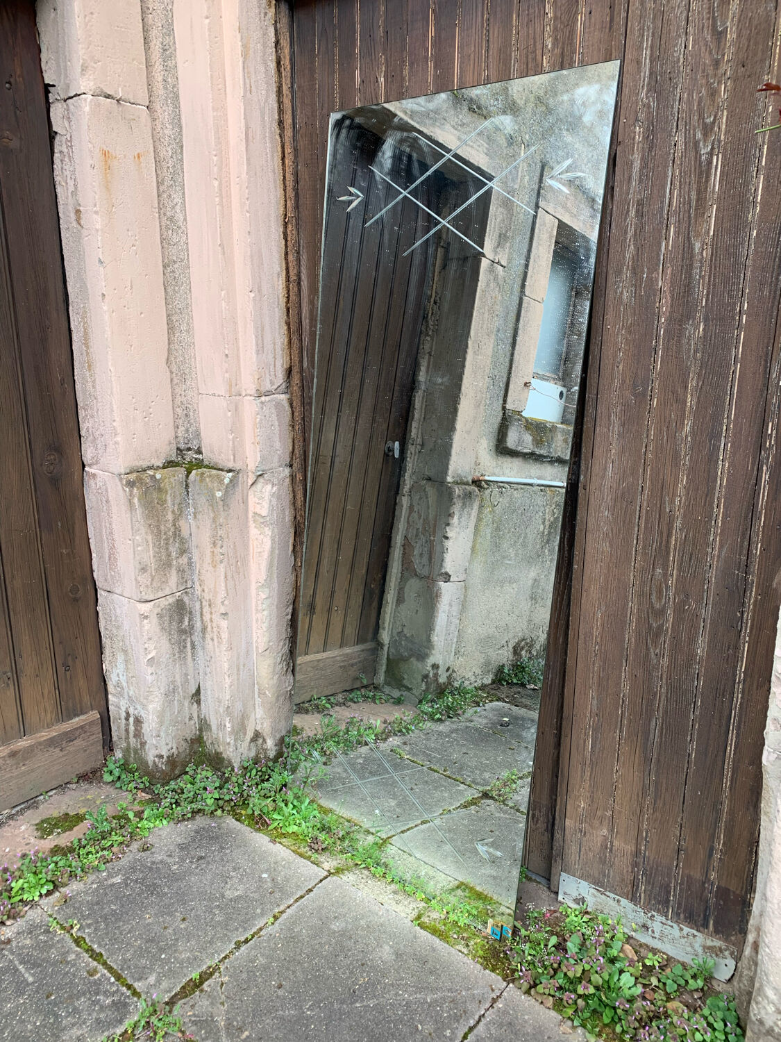 Marly brothers chiseled mirror in burgundy made in France 1950-1960