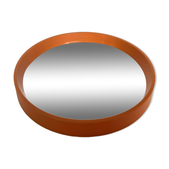 Old vintage orange round mirror