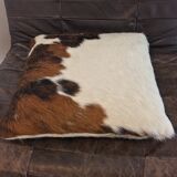Pouf and cow cushion, leather