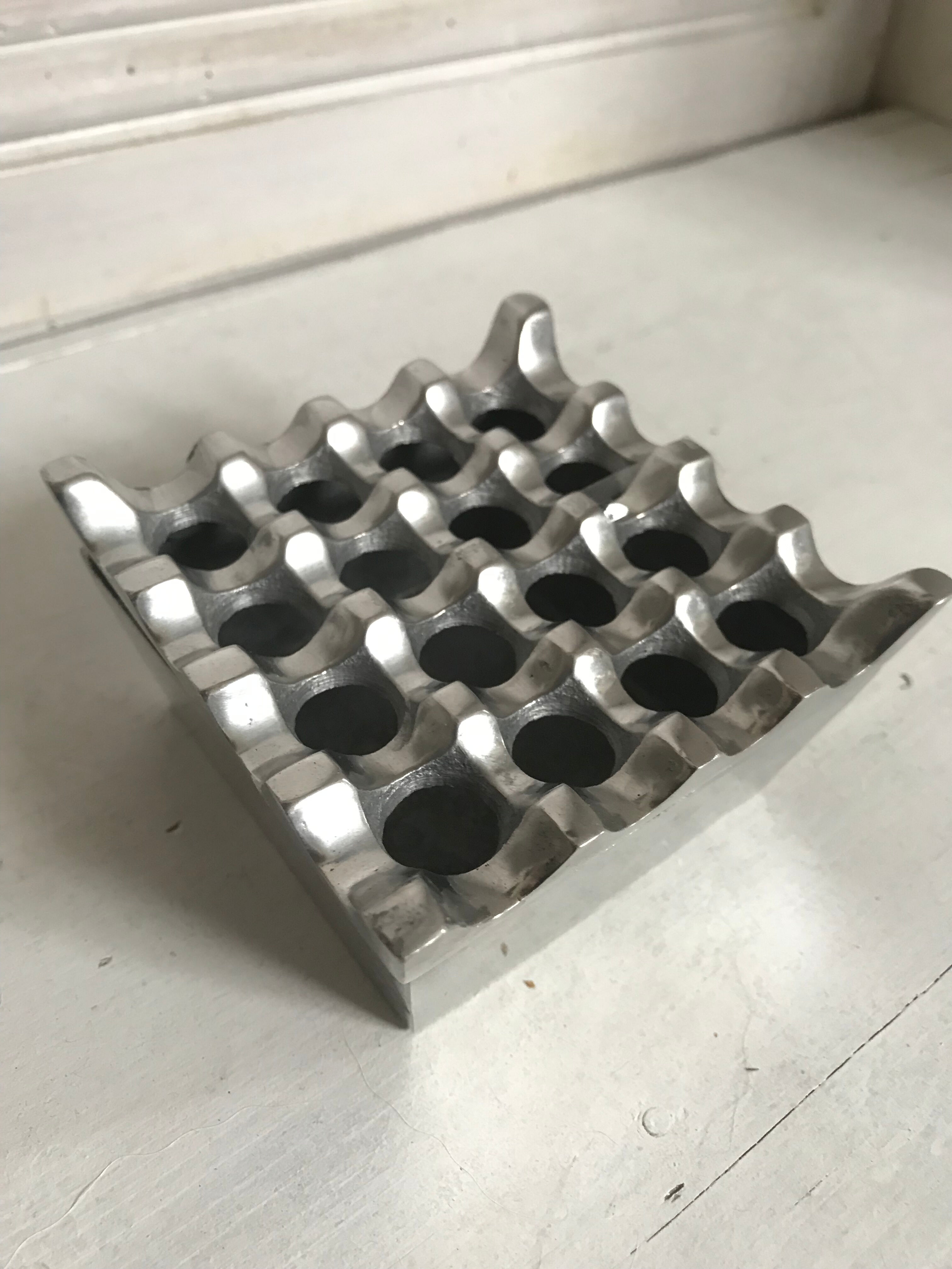 Design ashtray in cast aluminum