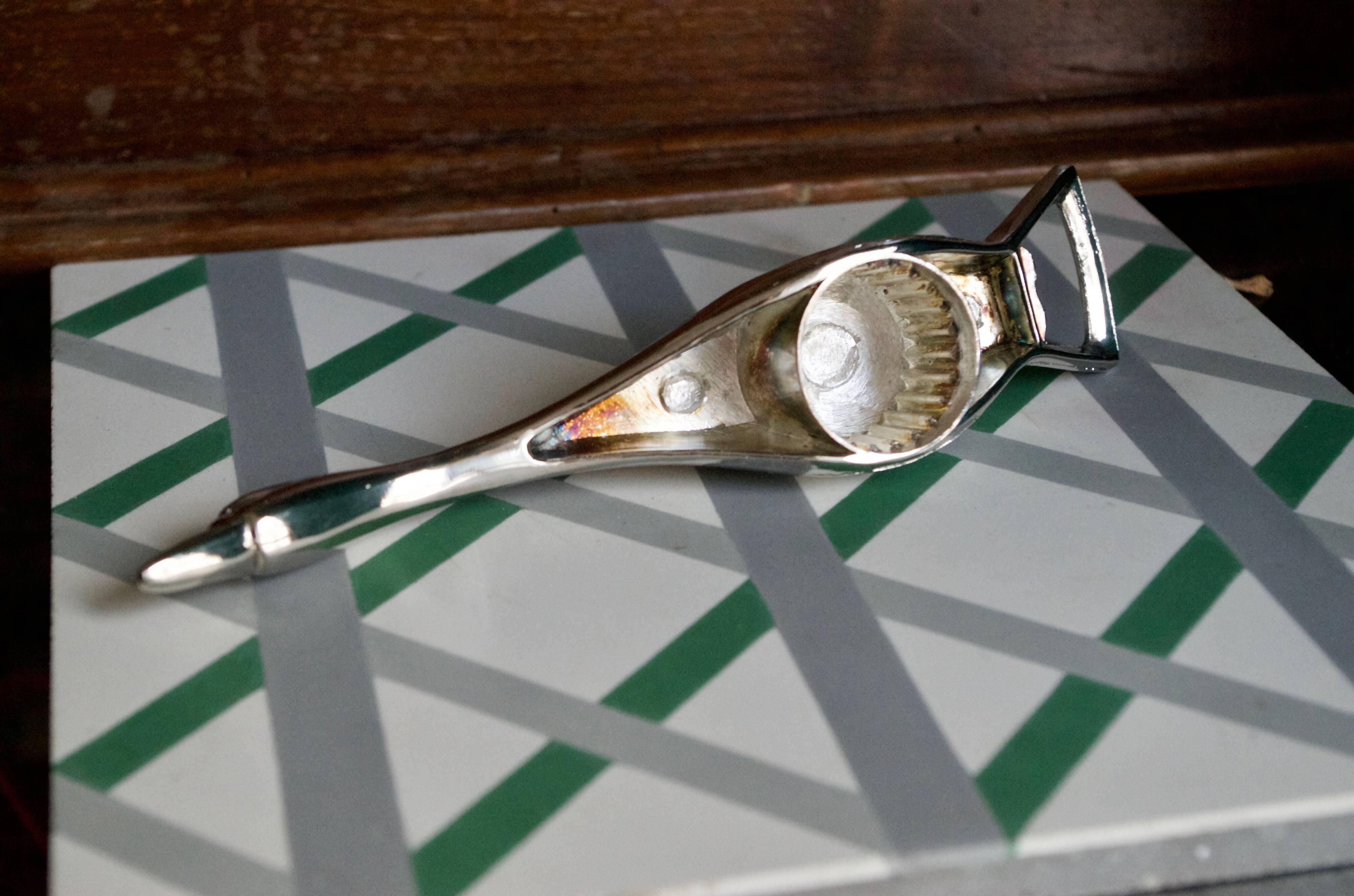 Vintage goose in flight bottle opener in silver metal