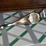 Décapsuleur vintage oie en vol en métal argenté