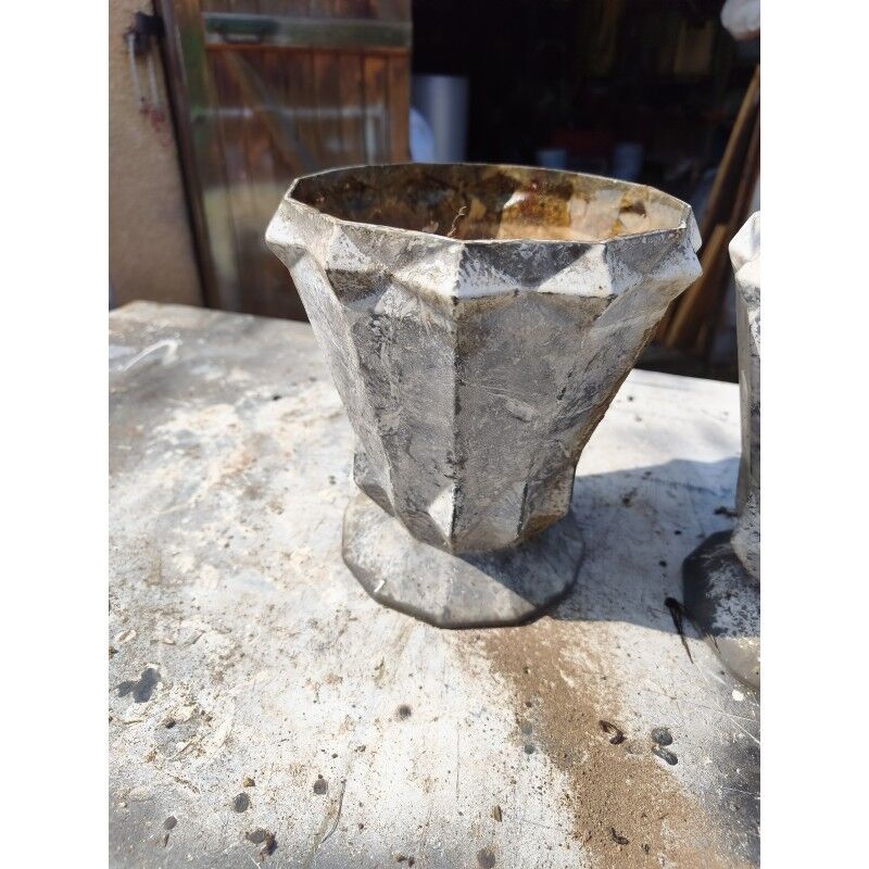 Pair of enamelled cast iron Art Deco vases
