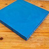 Blue formica trivet