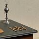Modernist desk in wood and green moleskin upholstery