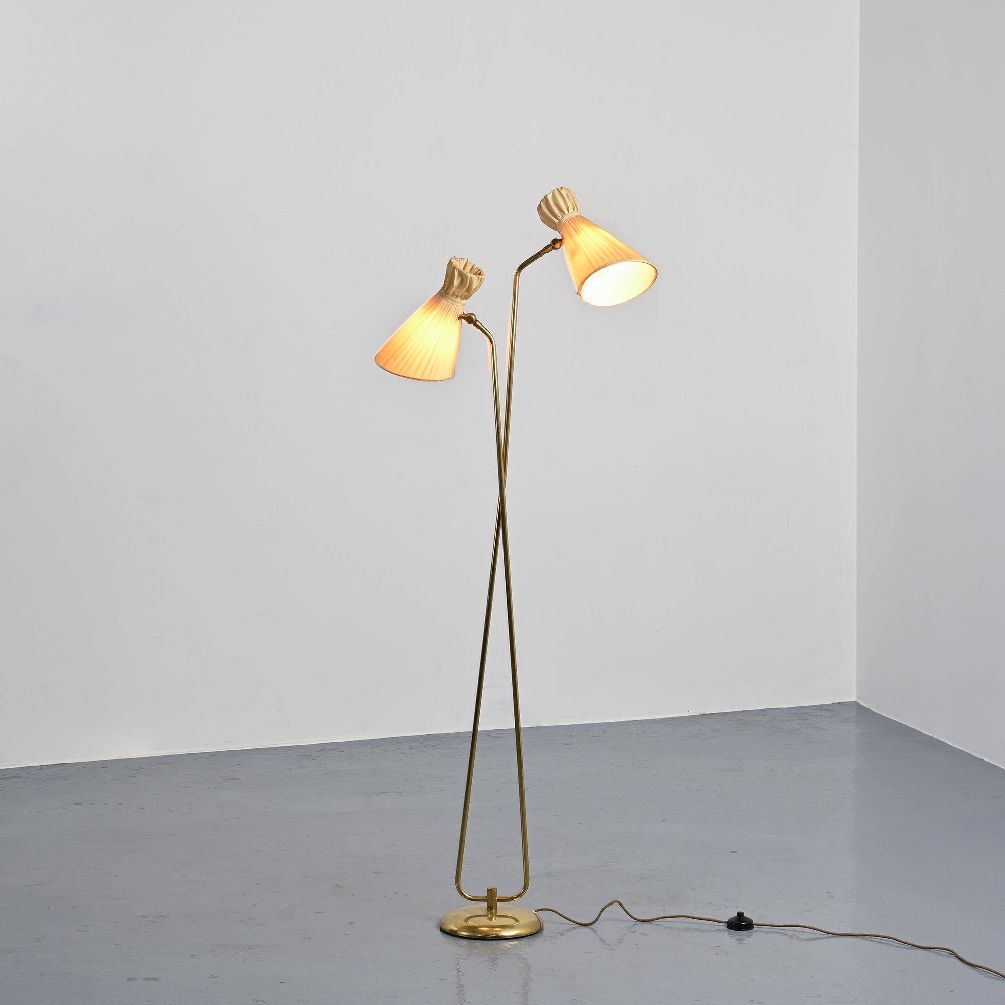 Two-arm adjustable floor lamp by BAG Turgi, Switzerland, 1950s.