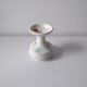 White and blue ceramic vase with italian relief