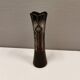 Crystal glass vase, in burgundy/reddish coloured glass with translucent details.