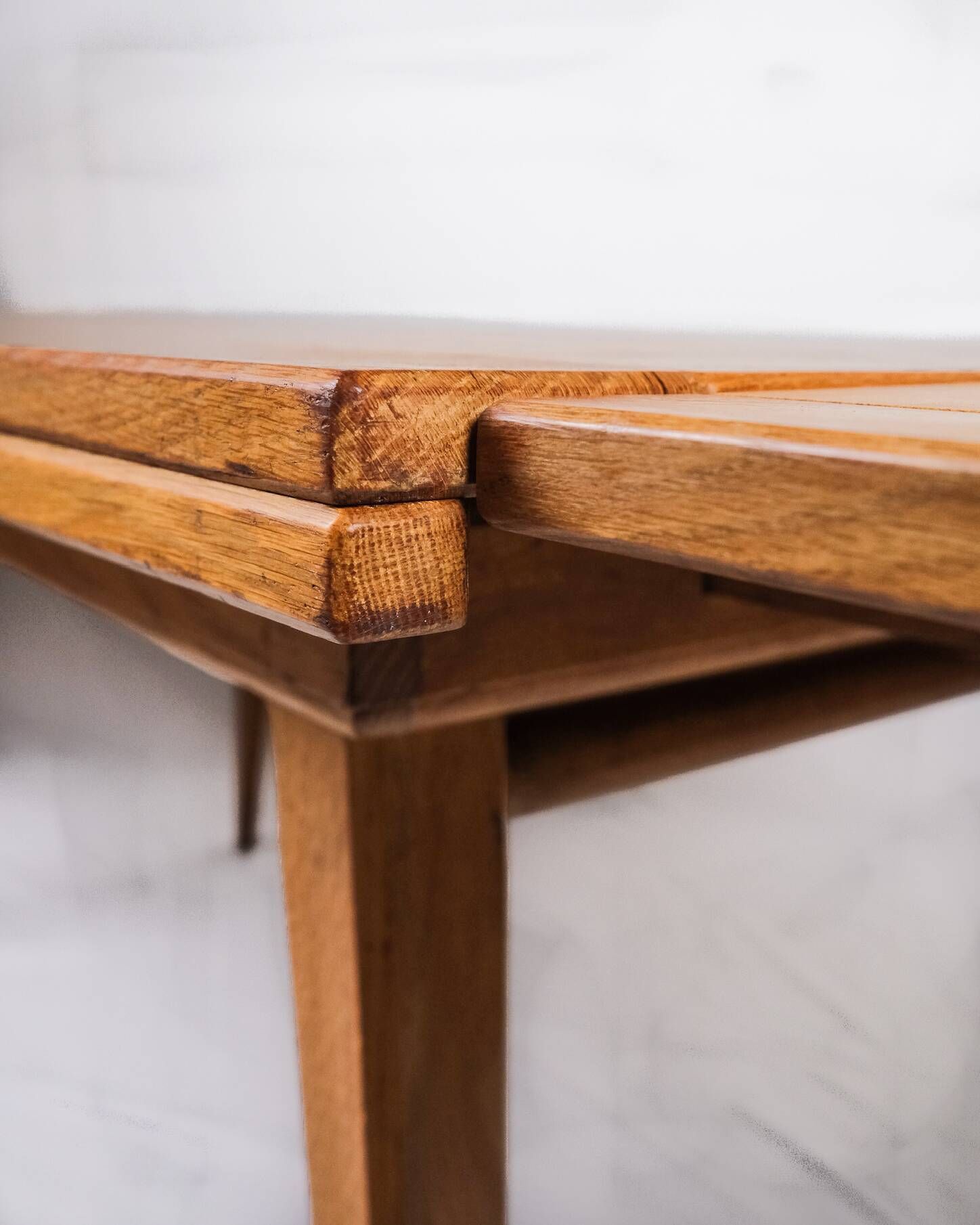 Extendable oak table in the style of Guillerme and Chambron, France 1960s