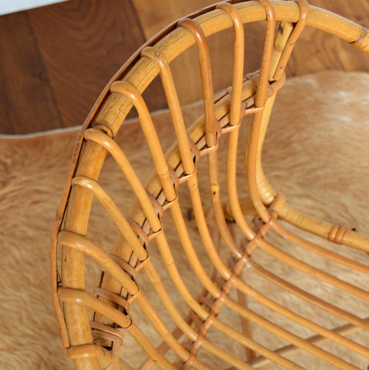 Children's shell armchair in rattan 1960s