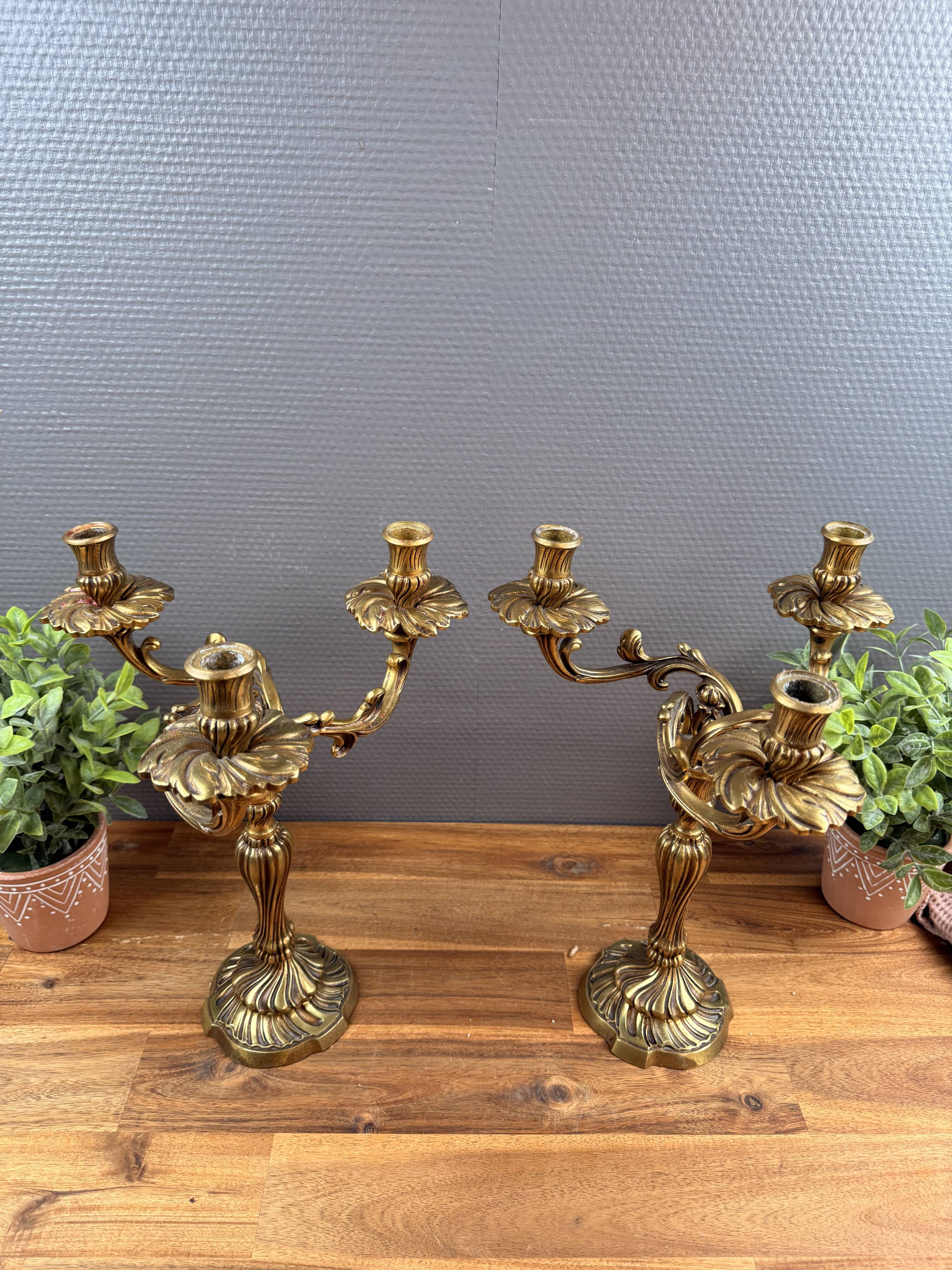 Pair of antique bronze candlesticks, Louis XV style