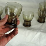 Set of 17 black smoked glasses on geometric engraving stand - 70s