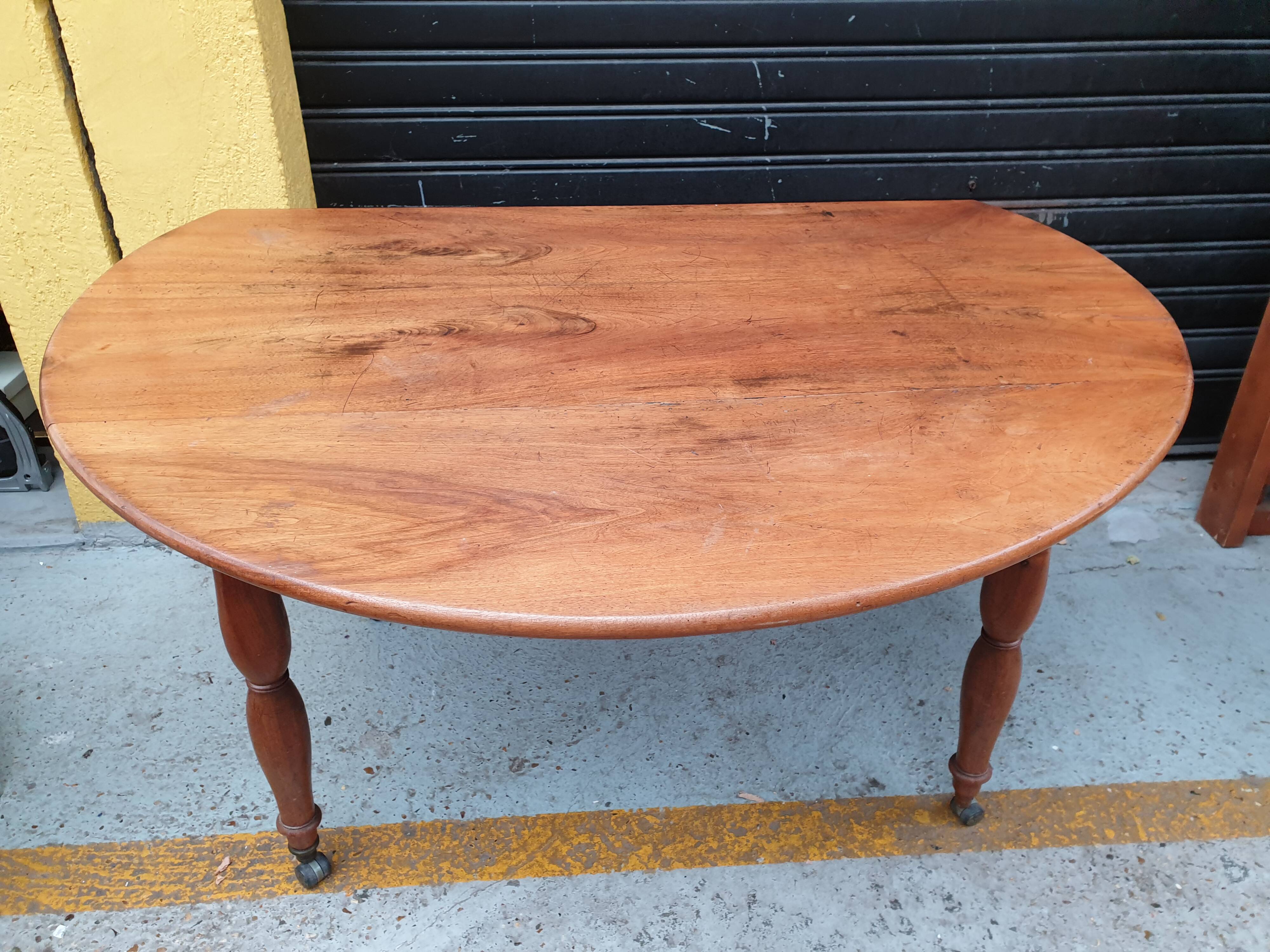 Beautiful old round table with fellers