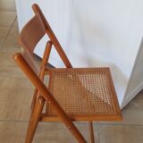 2 folding chairs in cannage