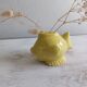 Ceramic piggy bank in the shape of a fish