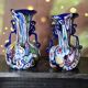 Pair of antique millefiori glass vases attributed to Murano with 2 handles.