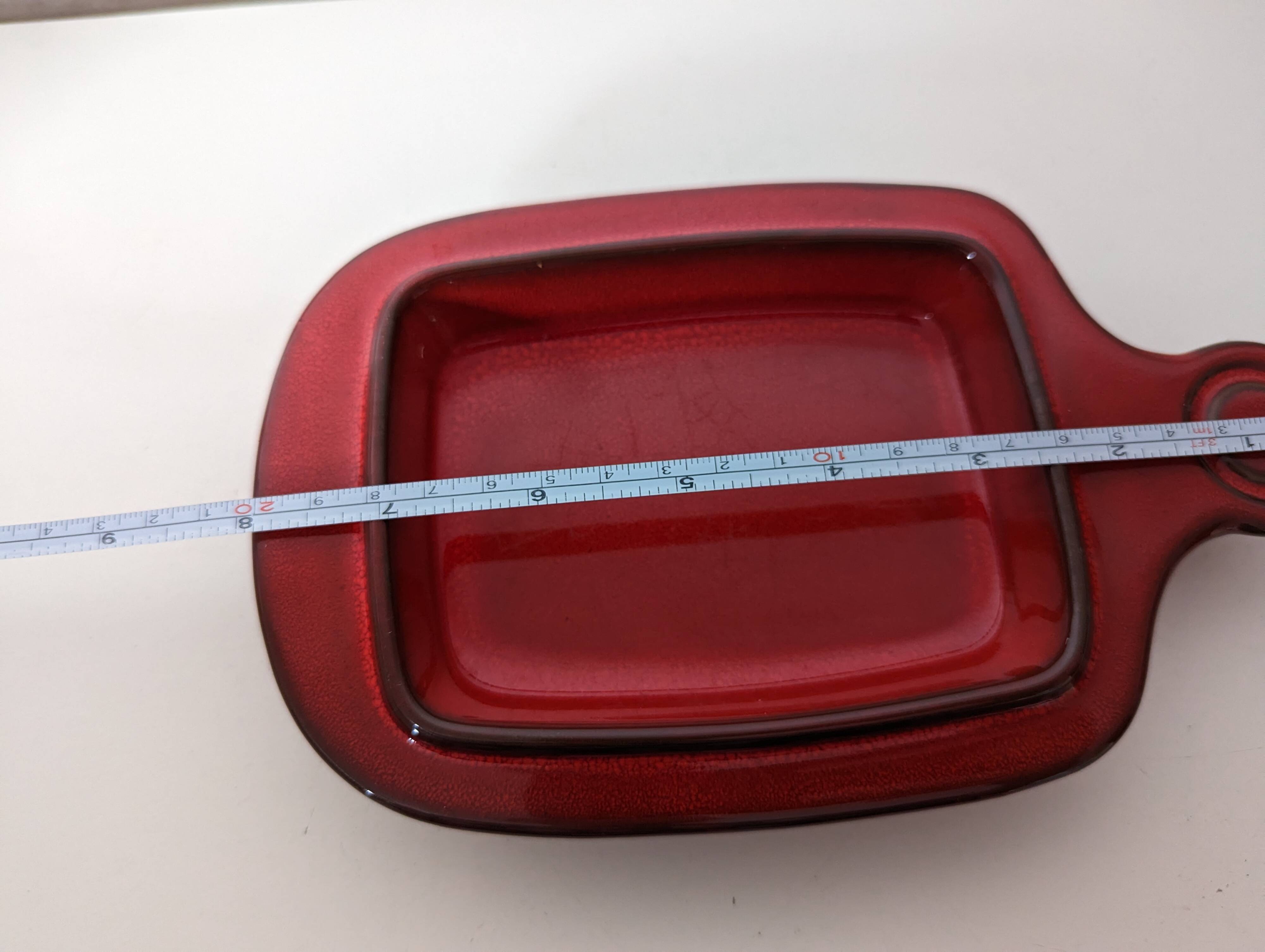red glazed stoneware butter dish