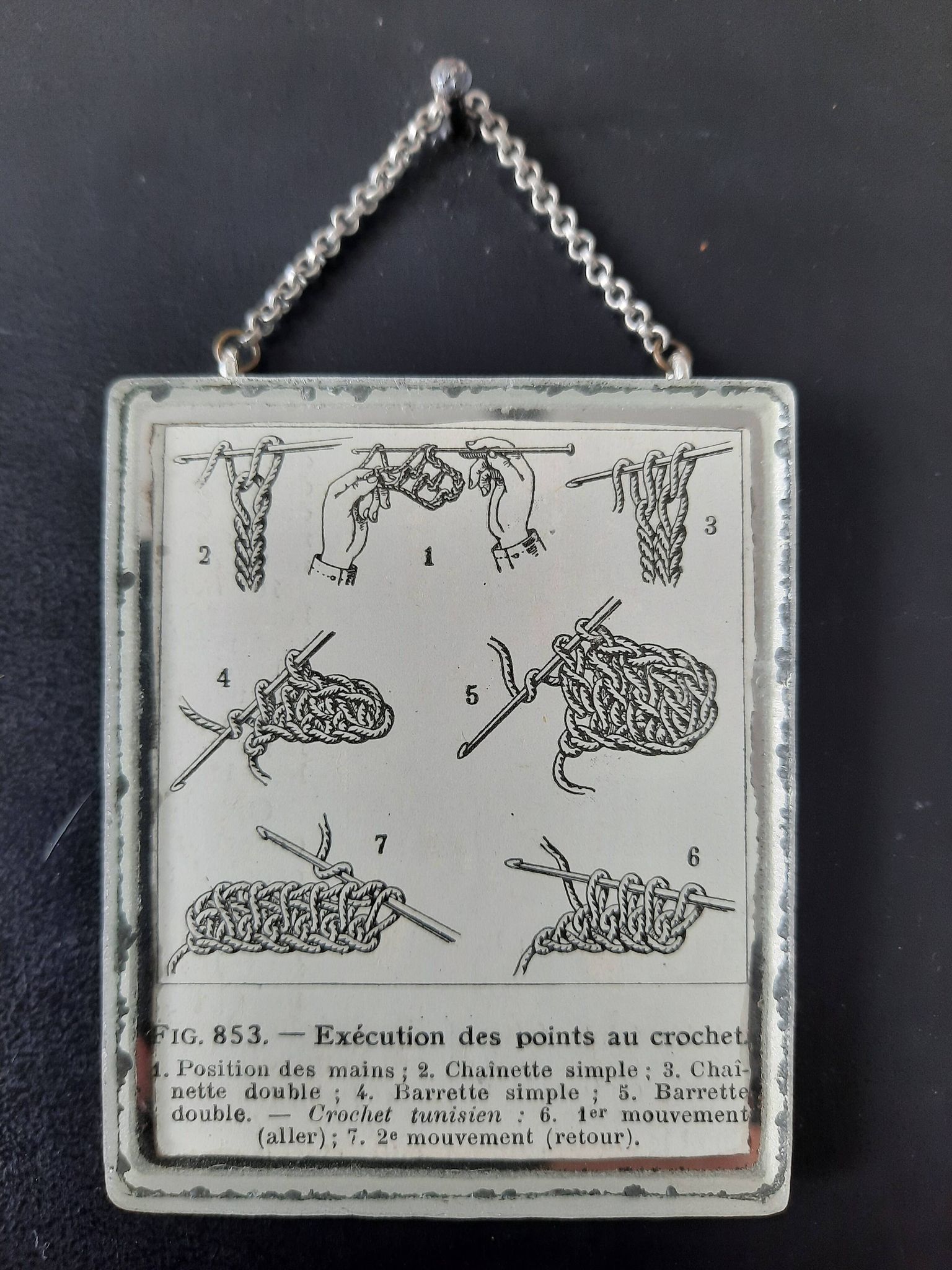 Antique illustration "Hook" inserted under a mirror. Cabinet of Curiosities.