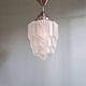 Art Deco suspended glass skyscraper, 1920s-30s.