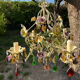 Vintage metal chandelier with porcelain flowers.