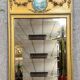 Louis XVI style trumeau mirror in gilded wood, circa 1900