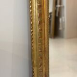 Miroir ancien de style Louis XVI, doré à la feuille