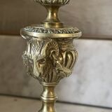 Pair of gilt bronze ram's head candlesticks, Louis XVI style, 19th century.