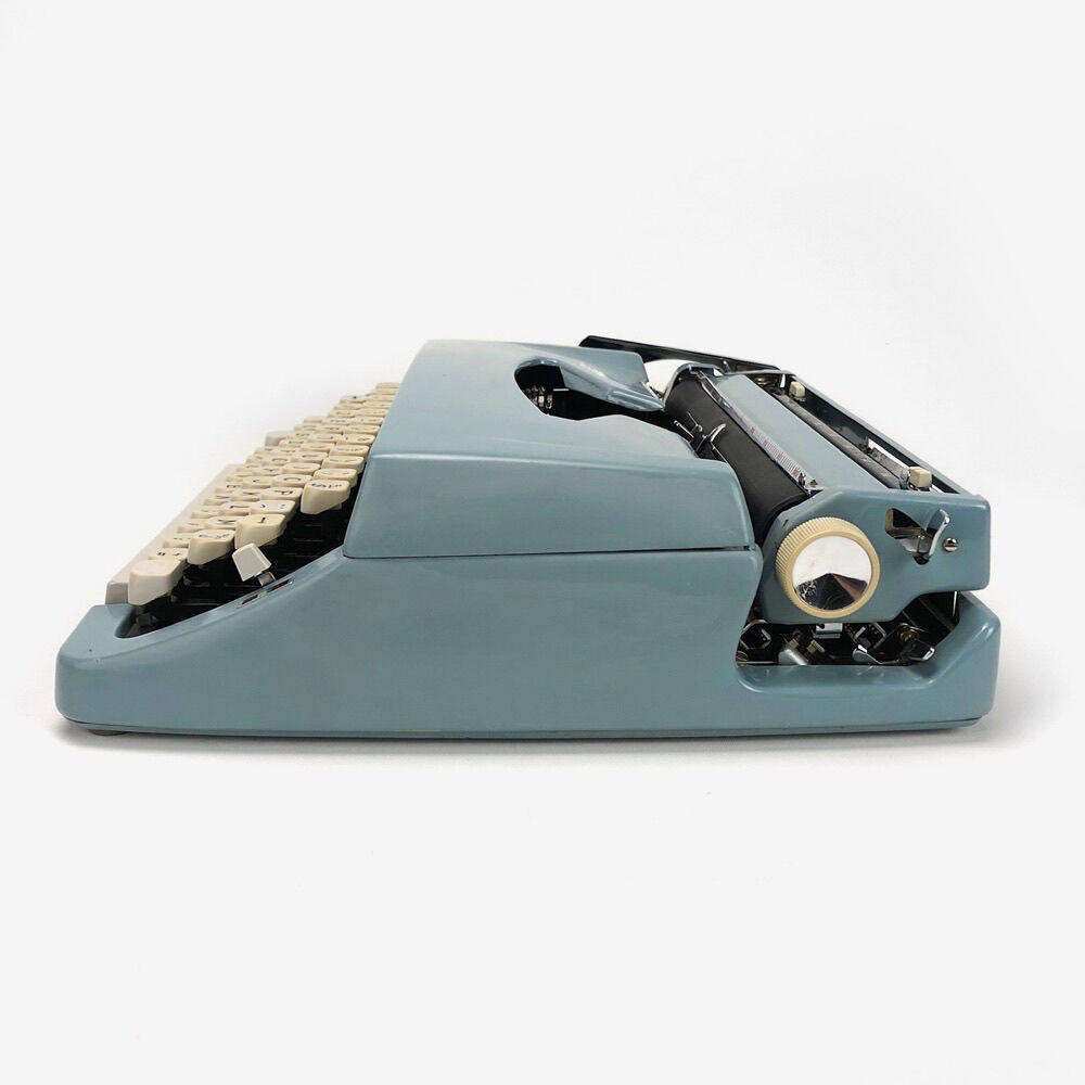 Brother Deluxe typewriter of the 60s and his briefcase