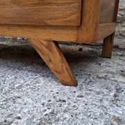 Compass leg chest of drawers