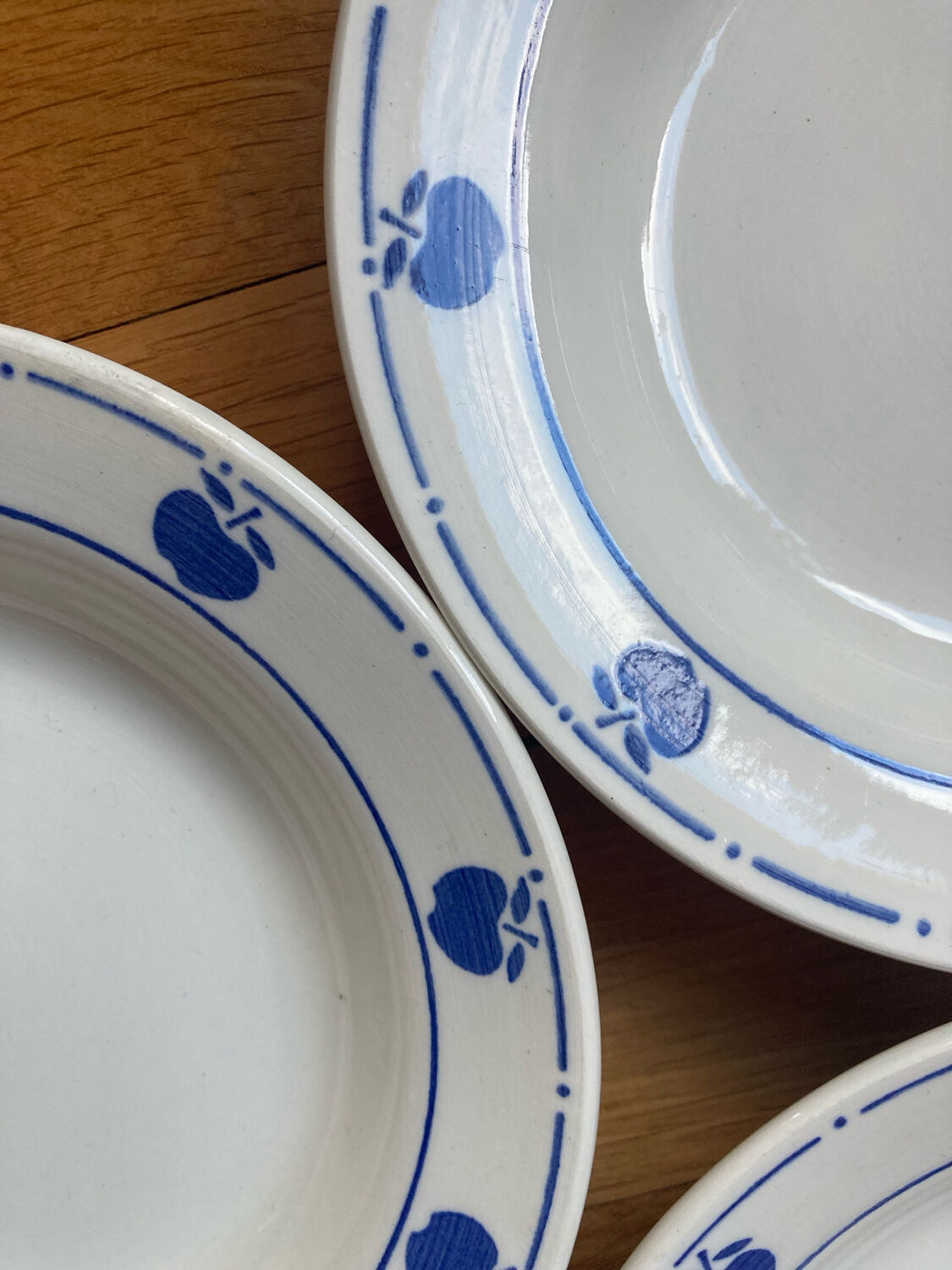 Deep plates with blue apple pattern
