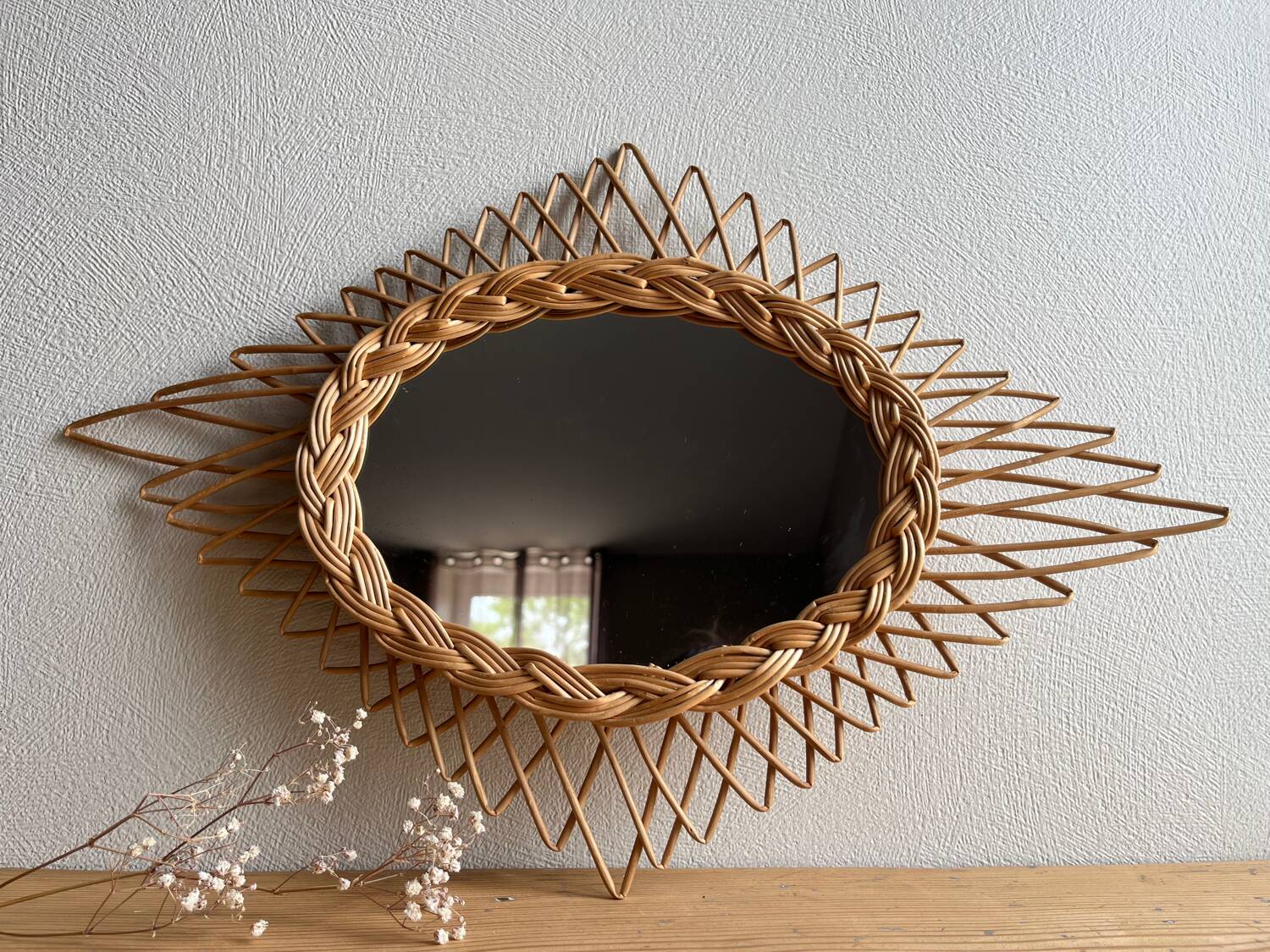 Vintage rattan mirror in star/diamond shape