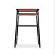 Set of 3 contemporary bar stools in natural brown leather and black rubber.